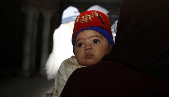 A Muslim boy waits to be circumcised at the Sidi Sahibi mausoleum during Eid-e-Milad-ul-Nabi, the birthday celebrations of Prophet Mohammad, in Kairouan January 24, 2013. 