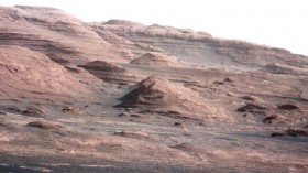 A chapter of the layered geological history of Mars is laid bare in this postcard from NASA's Curiosity rover. The image shows the base of Mount Sharp, the rover's eventual science destination.