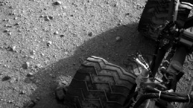 Soil clinging to the right middle and rear wheels of NASA's Mars rover Curiosity can be seen in this image taken by the Curiosity's Navigation Camera after the rover's third drive on Mars.