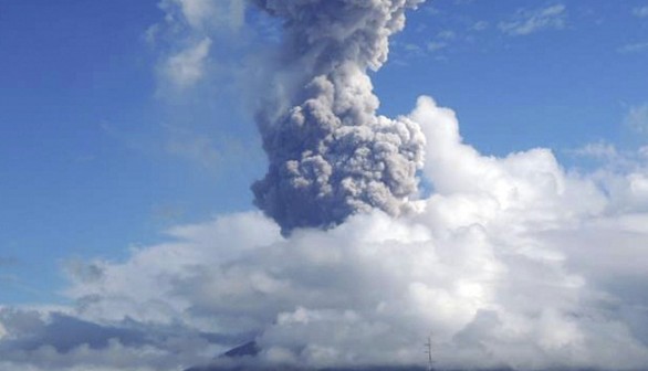 Ash rises after a mild eruption of Mayon Volcano in Legazpi city in central Philippines May 7, 2013.