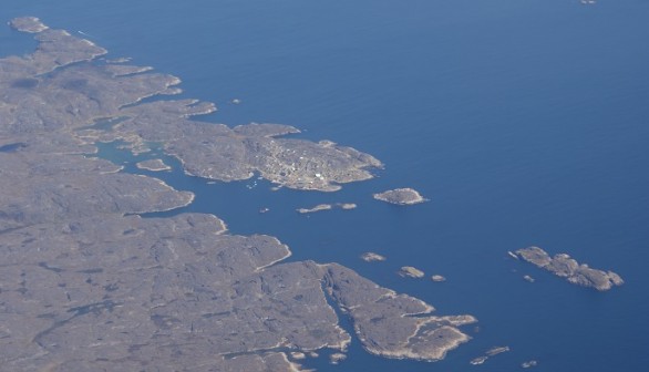 This is a village on the western Greenland coast called Atammik. 