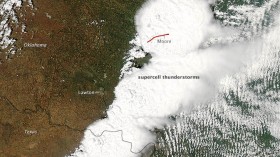 On May 20, 2013, a supercell thunderstorm in central Oklahoma spawned a destructive tornado that passed just south of Oklahoma City. The Moderate Resolution Imaging Spectroradiometer (MODIS) on NASA's