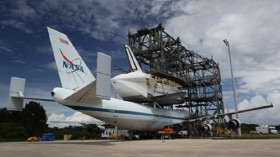 Space shuttle Endeavour is lowered onto the Shuttle Carrier Aircraft, or SCA, at the Shuttle Landing Facility at NASA's Kennedy Space Center in Florida. 