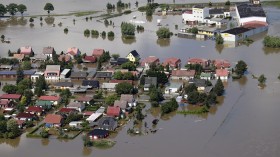 Houses are inundated by the waters of the Elbe river during floods near Magdeburg in the federal state of Saxony Anhalt, June 10, 2013.