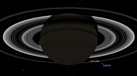 This simulated view from  Cassini shows the expected positions of Saturn and Earth on July 19, 2013. Cassini will be about 898 million miles away from Earth at the time.