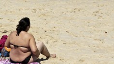 Overweight Woman on the Beach