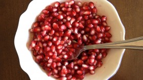 A bowl of pomegranate seeds 