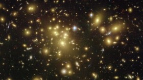 Hubble Uses Natural Lens To Magnify Distant Galaxies