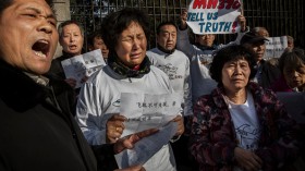 One Year Later Families Of MH370 Victims Still Waiting For Answers