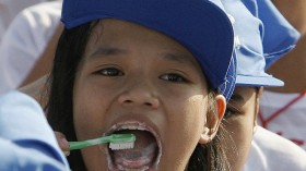 Girl Brushing Teeth