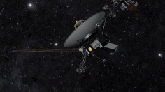 This artist's concept shows NASA's Voyager spacecraft against a field of stars in the darkness of space.