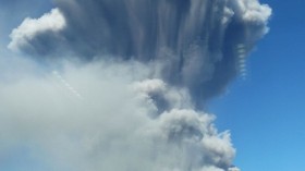 Smoke rises after an eruption of Mount Sakurajima in Kagoshima, southwestern Japan, in this photo taken through a window by Kyodo August 18, 2013