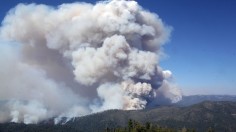 Smoke from the Rim Fire, viewed from the Pilot Peak Lookout, is shown in this undated United States Forest Service handout photo near Yosemite National Park, California, released to Aug 27, 2013