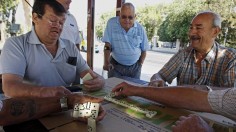 Men Play Dominoes