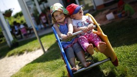 Young girls play outside