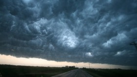 Severe thunderstorms, such as this one observed in Oklahoma in 2009, that could create tornadoes will become more common with global warming. 