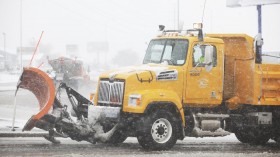 A snowplow is pictured during a snow storm in Rapid City, South Dakota, October 4, 2013. 