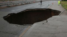 Sinkhole in one of the busy streets in Britain, What causes these phenomena?