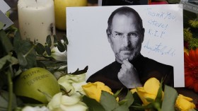 Tributes to the late Steve Jobs are left outside the Apple Store in London October 6, 2011