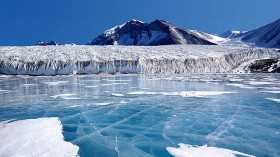 Antarctica. Pictured is blue ice covering Lake Fryxell, in the Transantarctic Mountains.