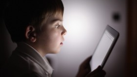 A Child Using Tablet