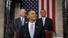 US President Barack Obama smiles as he arrives to deliver his State of the Union speech on Capitol Hill in Washington January 28, 2014. 