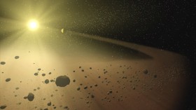 artist's concept, a narrow asteroid belt filled with rocks and dusty debris orbits a star similar to our own sun.