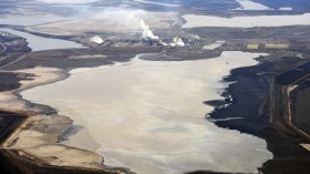 Syncrude tar sands plant and tailings pond at their tar sands operation north of Fort McMurray, Alberta, November 3, 2011.