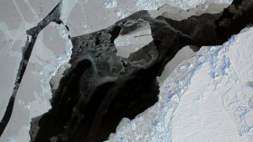 Satellite image of Arctic sea ice breaking up