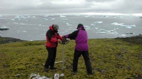 This image shows researchers drilling in the moss banks of Signy during the coring project in which the paper's core was obtained.