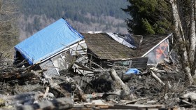 A landslide and structural debris blocks Highway 530 near Oso, Washington March 23, 2014.