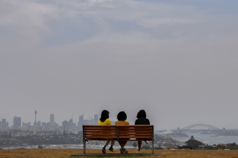 Smoke haze from bushfires in New South Wales is seen over the CBD of Sydney from Dudley Page Reserve in Sydney