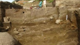 in the highlands of Kazakhstan, a mudbrick/clay oven (visible on right lower portion) contained earliest evidence for grain farming.