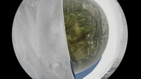 Enceladus, which has jets of water vapor and ice gushing from its south pole, also harbors a large interior ocean beneath an ice shell, as this illustration depicts.