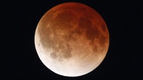 A shadow falls on the moon as it undergoes a total lunar eclipse as seen from Mexico City April 15, 2014.