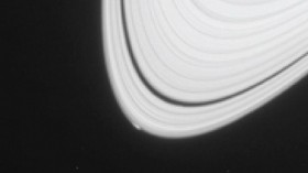 This image is a portion of an observation recorded by the narrow-angle camera of Cassini's imaging science subsystem on April 15, 2013.  The bright feature at the edge of the A ring is about 750 miles (about 1,200 kilometers) long. 