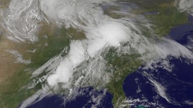 The violent weather system that spawned numerous tornadoes across the South and Midwestern US on Sunday was recorded from space by NASA satellites