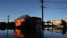 A house surrounded by flood water
