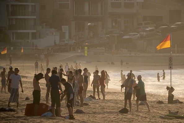 People Cooling off at the beach due to the heat wave