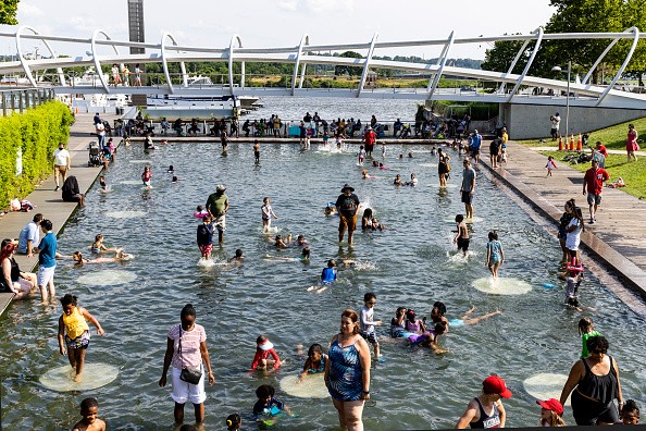 People Cooling off due to the heat