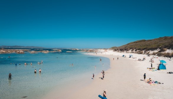 People Cooling off at the beach due to the heat wave