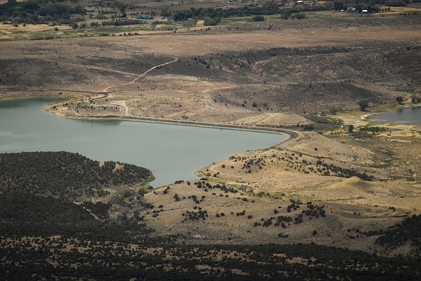Lower than normal water levels in a reservoir during drought