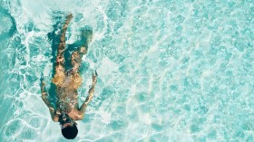 Man Snorkeling Under Water