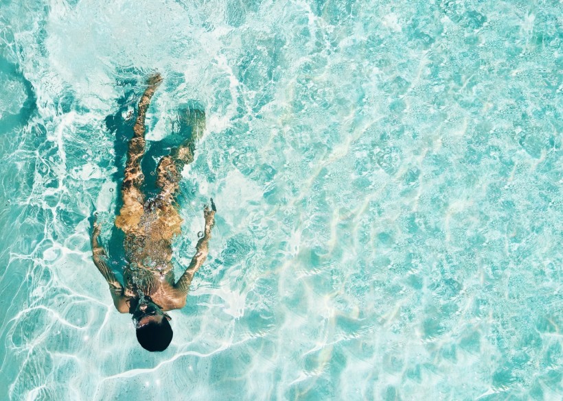 Man Snorkeling Under Water