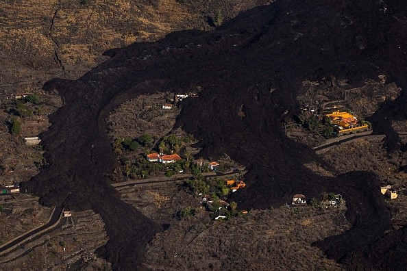 Lava from a volcano eruption flows on the island of La Palma in the Canaries