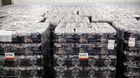 Pallets of bottled water are seen ready for distribution in a warehouse which is an emergency water supply for residents affected by lead-contaminat
