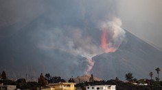 Ash and smoke rise from the Cumbre Vieja Volcano 