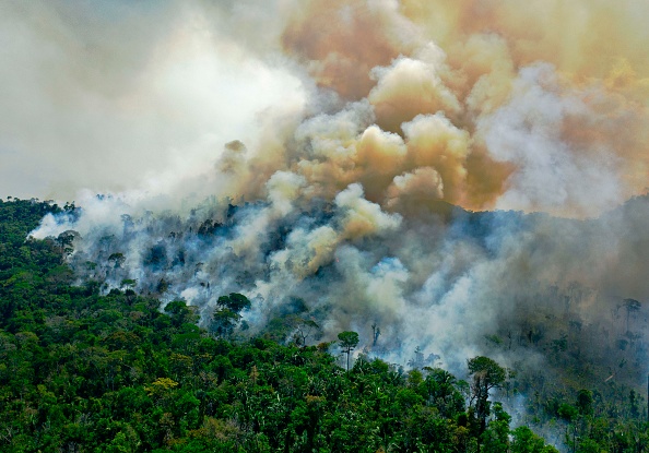 Burning area of Amazon rainforest reserve, south of Novo Progresso in Para state show how deforestation has aggravated a rise in greenhouse gas emissions