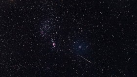 Meteor streaking through the night sky