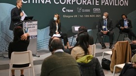 Former US Vice President Al Gore (2R) attends a panel discussion at the China Corporate Pavilion during the COP26 UN Climate Change Conference in Glasgow, Scotland 